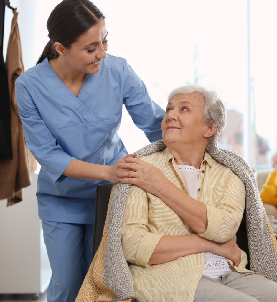 Caregiver supporting an older adult at home