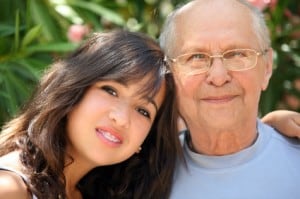 Elderly Man Posing with Young Girl