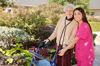 Female Patient Posing Outside with Elder Patient